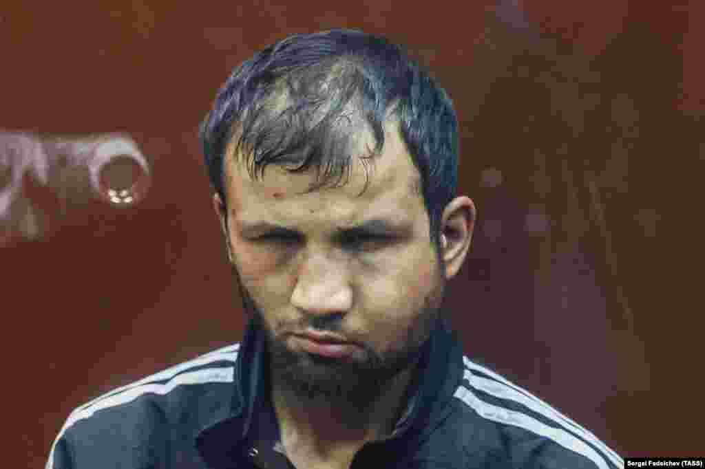 Shamsiddin is seen here pictured in court in Moscow on March 24 with a swollen and bruised face. Earlier, the Tajik man was filmed as he was apparently being tortured by security forces with an electrical cable attached to his genitals. Aiden Aslin, a British national who was captured by Russia while fighting for Ukraine during the battle of Mariupol, told RFE/RL that he believes the publication of apparent torture of the terror suspects is intended to "set an example." The former Ukrainian marine says such abuse of suspects yet to be found guilty of any crime is at "the same level" as the extrajudicial violence he says he witnessed while in Russian captivity. 