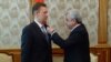 Armenia - President Serzh Sarkisian (R) gives a medal to Gazprom Chairman Alexei Miller, Yerevan, 16Apr2015.