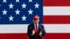 US President Donald Trump claps as he arrives to speak at the Salute to America Celebration at the Iowa State Fairgrounds in Des Moines on July 3, 2025.