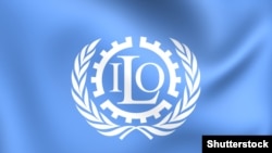 Эмблема Международной организации труда (ILO) Фото Shutterstock