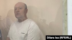 Шымкенттік белсенді Жанмұрат Аштаев сот үкімін тыңдап тұр. Шымкент, 15 шілде 2022 жыл.
