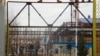 Ворота Атырауского нефтеперерабатывающего завода. Ноябрь 2009 года. 