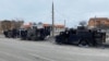 Знищені бронеавтомобілі високої прохідності російської армії «Тигр-М» на дорозі в Харкові, 28 лютого 2022 року
