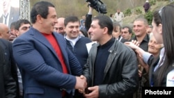 Armenia - Prosperous Armenia Party leader Gagik Tsarukian (L) campaigns in Dilijan, 17Apr2012.