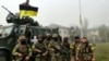 Військовослужбовці 131-го окремого розвідувального батальйону Сухопутних військ ЗСУ святкують звільнення від армії РФ міста Снігурівки, що на Миколаївщині. Снігурівка, 10 листопада 2022 року, ілюстративне фото